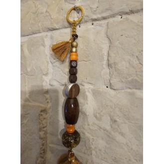 orange brown key ring with small tassels